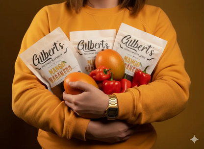 Girl holding bags of gilberts premium beef jerky Mango Habanero 